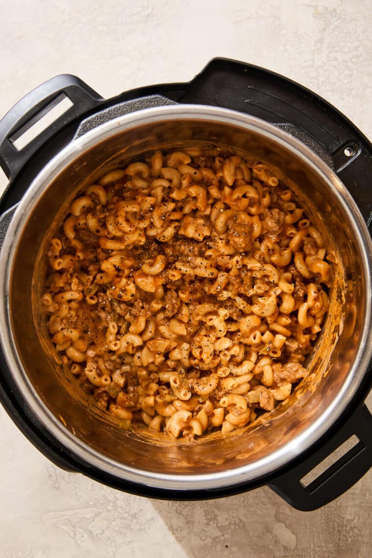 Instant Pot Cheeseburger Mac and Cheese - Homemade hamburger helper! Quick, easy, budget-friendly, and tastes SO much better than the boxed mix. A family (and childhood) favorite!