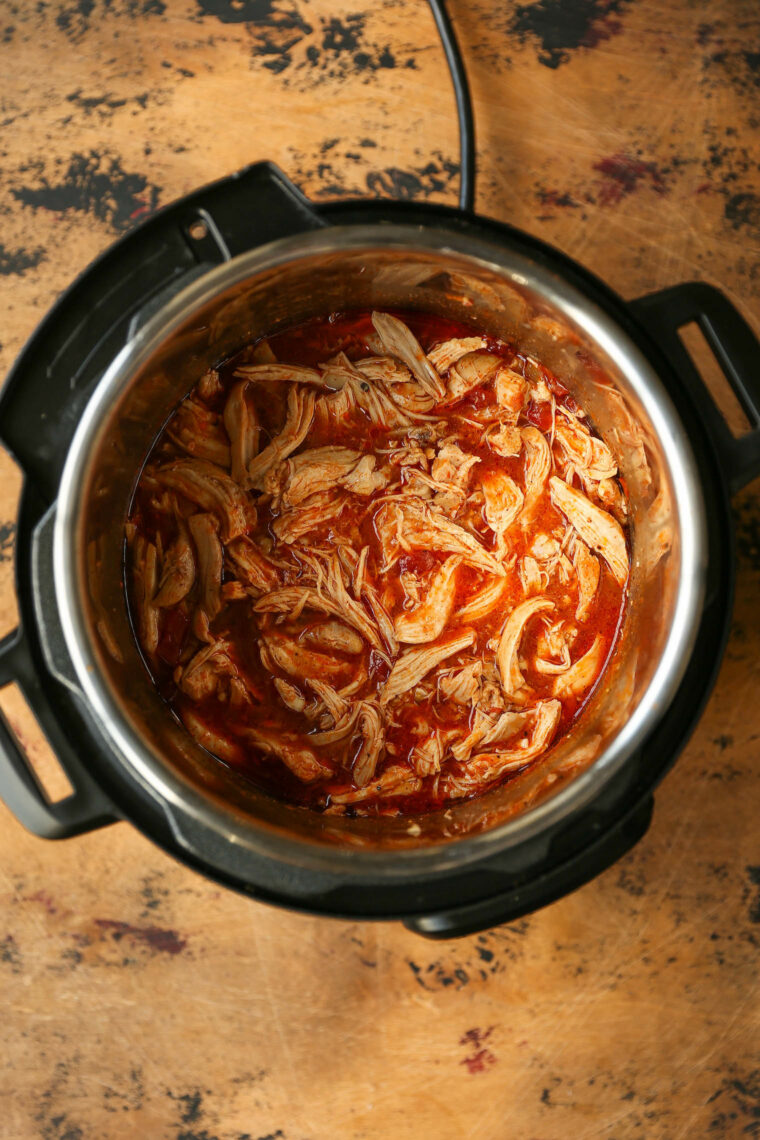 Instant Pot Chicken Nachos - Need to whip up the BEST EVER nachos for a crowd with minimal effort? THIS IS IT! Fully loaded and so so good.