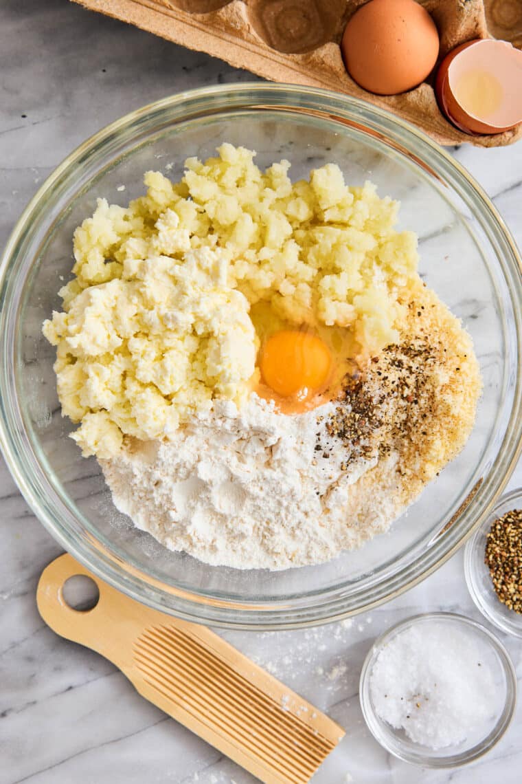 Homemade Gnocchi - Light, pillow-y, fluffy, AND SO EASY to make (just 5 ingredients!). You won't be able to go back to store-bought gnocchi!